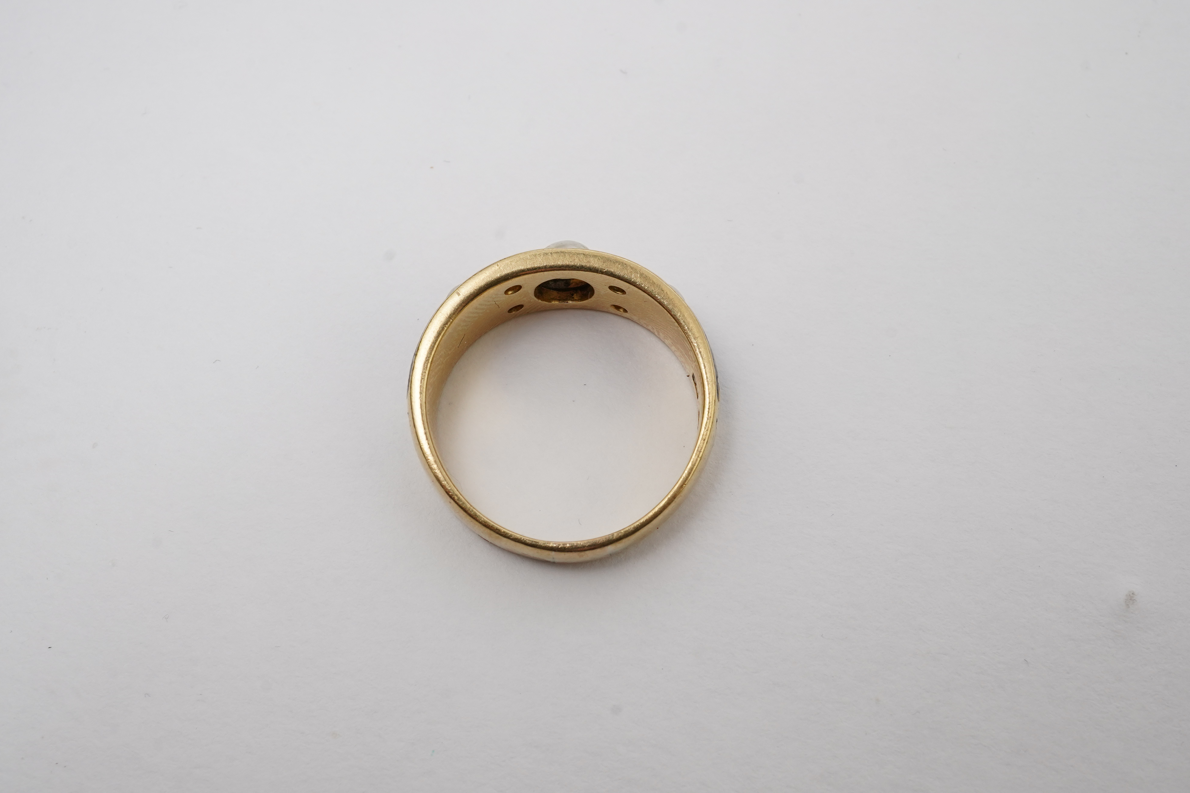 A Victorian pearl, enamel and diamond mourning ring, late 19th century